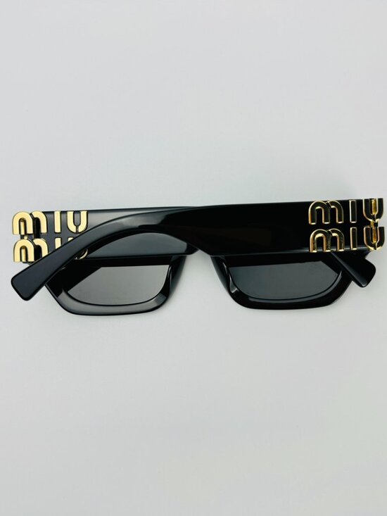 ✨ Miu Miu SMU 09W Black Sunglasses with Iconic Gold Logo Accents ✨